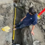 installing a pipe in a yard